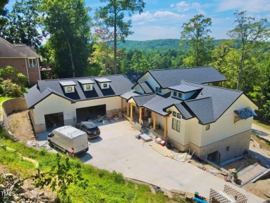 A rare fusion of timeless architecture and elevated design, this on Governors Club in North Carolina - for sale on GolfHomes.com, golf home, golf lot