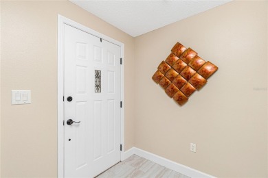 Well-maintained 3-bedroom, 2-bathroom POOL home with 2-car on Deep Creek Golf Club in Florida - for sale on GolfHomes.com, golf home, golf lot