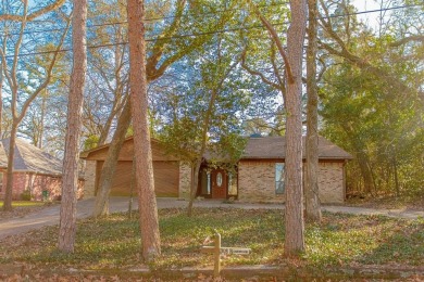 The home is on a quiet street and a quick walk to the Third Lake on Hide-A-Way Lake Golf Course in Texas - for sale on GolfHomes.com, golf home, golf lot