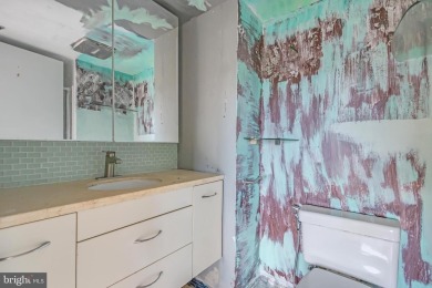 Discover an incredible opportunity to own a large, light-filled on Leisure World Golf Club in Maryland - for sale on GolfHomes.com, golf home, golf lot