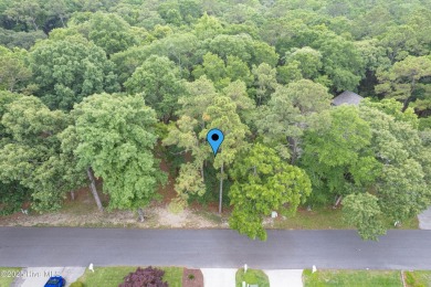 Discover your own piece of paradise in the gated, waterfront on Lockwood Folly Country Club in North Carolina - for sale on GolfHomes.com, golf home, golf lot