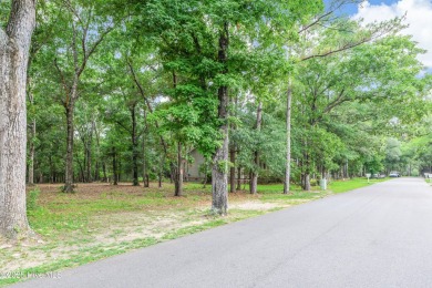 Discover your own piece of paradise in the gated, waterfront on Lockwood Folly Country Club in North Carolina - for sale on GolfHomes.com, golf home, golf lot