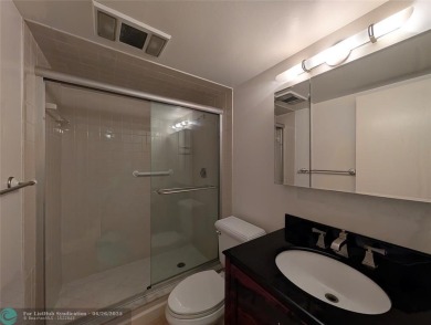Beautifully updated and furnished, large 2 bedroom condominium on Palm-Aire Country Club and Resort - The Oaks in Florida - for sale on GolfHomes.com, golf home, golf lot