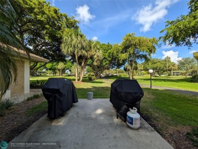 Beautifully updated and furnished, large 2 bedroom condominium on Palm-Aire Country Club and Resort - The Oaks in Florida - for sale on GolfHomes.com, golf home, golf lot