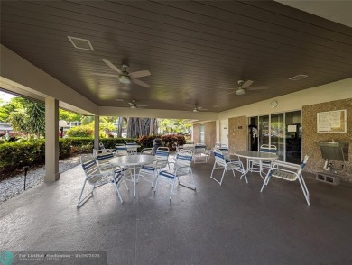 Beautifully updated and furnished, large 2 bedroom condominium on Palm-Aire Country Club and Resort - The Oaks in Florida - for sale on GolfHomes.com, golf home, golf lot