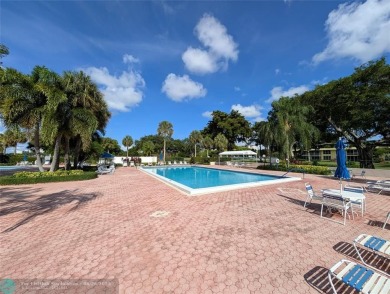 Beautifully updated and furnished, large 2 bedroom condominium on Palm-Aire Country Club and Resort - The Oaks in Florida - for sale on GolfHomes.com, golf home, golf lot