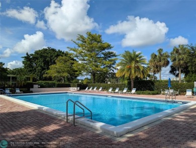 Beautifully updated and furnished, large 2 bedroom condominium on Palm-Aire Country Club and Resort - The Oaks in Florida - for sale on GolfHomes.com, golf home, golf lot