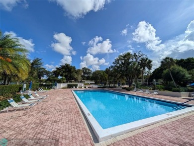 Beautifully updated and furnished, large 2 bedroom condominium on Palm-Aire Country Club and Resort - The Oaks in Florida - for sale on GolfHomes.com, golf home, golf lot