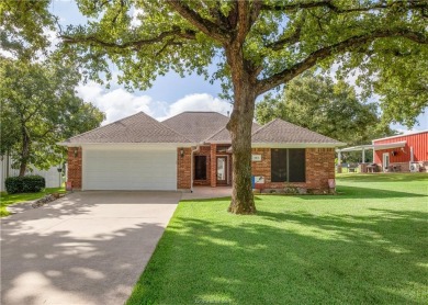 Welcome home to Hilltop Lakes. This beautiful full brick 3 on Hilltop Lakes Resort Golf Club in Texas - for sale on GolfHomes.com, golf home, golf lot
