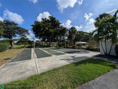 Beautifully updated and furnished, large 2 bedroom condominium on Palm-Aire Country Club and Resort - The Oaks in Florida - for sale on GolfHomes.com, golf home, golf lot