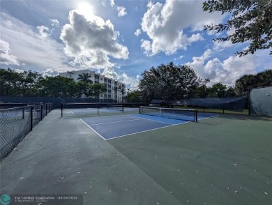 Beautifully updated and furnished, large 2 bedroom condominium on Palm-Aire Country Club and Resort - The Oaks in Florida - for sale on GolfHomes.com, golf home, golf lot