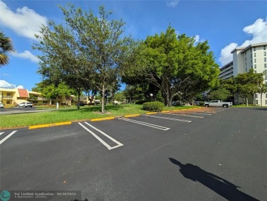 Beautifully updated and furnished, large 2 bedroom condominium on Palm-Aire Country Club and Resort - The Oaks in Florida - for sale on GolfHomes.com, golf home, golf lot