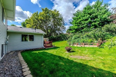 Great curb appeal is only the beginning! The concrete drive, 3 on Wild Marsh Golf Club in Minnesota - for sale on GolfHomes.com, golf home, golf lot