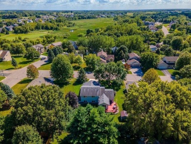 Great curb appeal is only the beginning! The concrete drive, 3 on Wild Marsh Golf Club in Minnesota - for sale on GolfHomes.com, golf home, golf lot