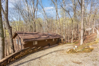 A charming cabin in the woods, move in ready, with 2 bedrooms, 1 on Hide-A-Way Hills Golf Club in Ohio - for sale on GolfHomes.com, golf home, golf lot