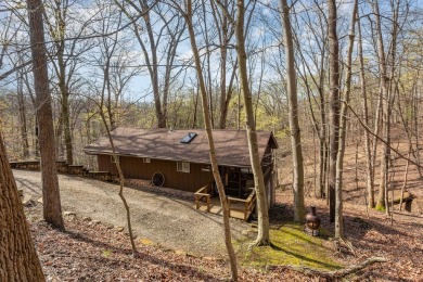 A charming cabin in the woods, move in ready, with 2 bedrooms, 1 on Hide-A-Way Hills Golf Club in Ohio - for sale on GolfHomes.com, golf home, golf lot