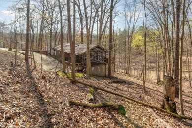 A charming cabin in the woods, move in ready, with 2 bedrooms, 1 on Hide-A-Way Hills Golf Club in Ohio - for sale on GolfHomes.com, golf home, golf lot
