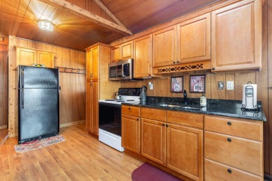 A charming cabin in the woods, move in ready, with 2 bedrooms, 1 on Hide-A-Way Hills Golf Club in Ohio - for sale on GolfHomes.com, golf home, golf lot