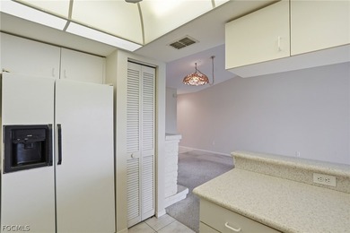 Welcome to Oakmont Village! This desirable 2nd-floor condo at on Hideaway Country Club in Florida - for sale on GolfHomes.com, golf home, golf lot