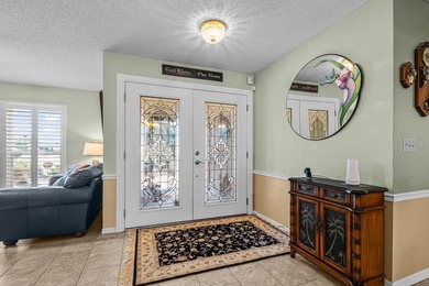 Beautiful 3-bed, 2-bath, 2-car HEATED POOL HOME with GOLF COURSE on Caloosa Greens Executive Golf Course in Florida - for sale on GolfHomes.com, golf home, golf lot