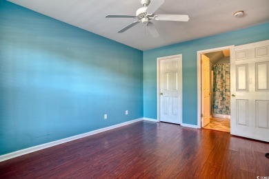 Welcome home to true Southern charm in the heart of Murrells on International Club of Myrtle Beach in South Carolina - for sale on GolfHomes.com, golf home, golf lot