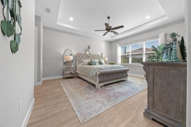 This Renown model features three bedrooms, each with its own on Stone Creek Golf Club in Florida - for sale on GolfHomes.com, golf home, golf lot