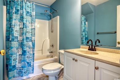 Welcome home to true Southern charm in the heart of Murrells on International Club of Myrtle Beach in South Carolina - for sale on GolfHomes.com, golf home, golf lot