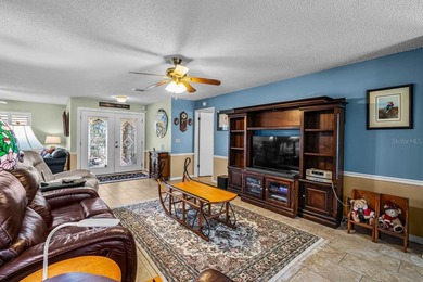 Beautiful 3-bed, 2-bath, 2-car HEATED POOL HOME with GOLF COURSE on Caloosa Greens Executive Golf Course in Florida - for sale on GolfHomes.com, golf home, golf lot