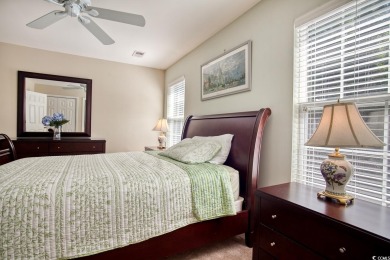 Welcome home to true Southern charm in the heart of Murrells on International Club of Myrtle Beach in South Carolina - for sale on GolfHomes.com, golf home, golf lot