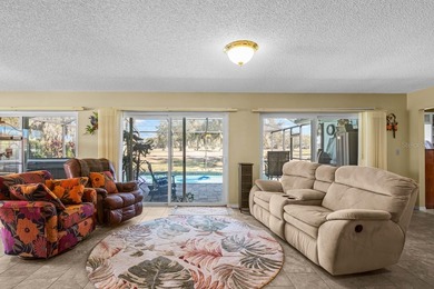 Beautiful 3-bed, 2-bath, 2-car HEATED POOL HOME with GOLF COURSE on Caloosa Greens Executive Golf Course in Florida - for sale on GolfHomes.com, golf home, golf lot