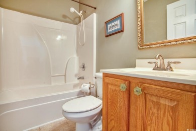 Welcome home to true Southern charm in the heart of Murrells on International Club of Myrtle Beach in South Carolina - for sale on GolfHomes.com, golf home, golf lot