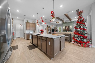 This Renown model features three bedrooms, each with its own on Stone Creek Golf Club in Florida - for sale on GolfHomes.com, golf home, golf lot