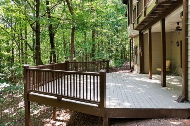 This beautifully renovated custom, home is privately situated in on Big Canoe Golf Club - Cherokee in Georgia - for sale on GolfHomes.com, golf home, golf lot