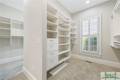 Experience luxury and comfort in this extraordinary 5-bedroom, 5 on The Georgia Club in Georgia - for sale on GolfHomes.com, golf home, golf lot