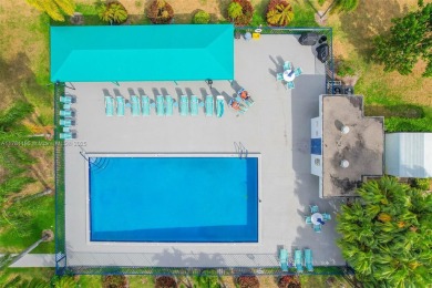 Discover this amazing opportunity in Lake Worth! This spacious on Poinciana Golf Club in Florida - for sale on GolfHomes.com, golf home, golf lot