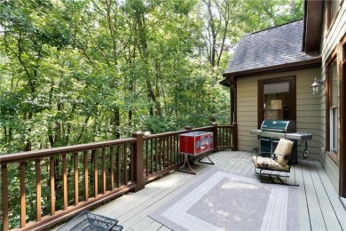 This beautifully renovated custom, home is privately situated in on Big Canoe Golf Club - Cherokee in Georgia - for sale on GolfHomes.com, golf home, golf lot