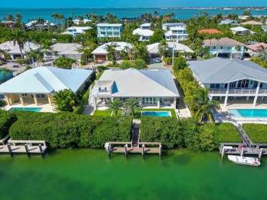 180 13th St, Key Colony Beach. Luxury waterfront living meets on Key Colony Beach Golf Course in Florida - for sale on GolfHomes.com, golf home, golf lot