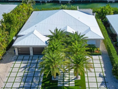 180 13th St, Key Colony Beach. Luxury waterfront living meets on Key Colony Beach Golf Course in Florida - for sale on GolfHomes.com, golf home, golf lot