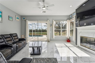 Beautiful 3-bedroom, 2-bath pool home with a 2-car garage on Southern Woods Golf Club in Florida - for sale on GolfHomes.com, golf home, golf lot