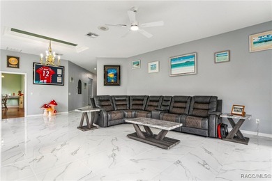 Beautiful 3-bedroom, 2-bath pool home with a 2-car garage on Southern Woods Golf Club in Florida - for sale on GolfHomes.com, golf home, golf lot