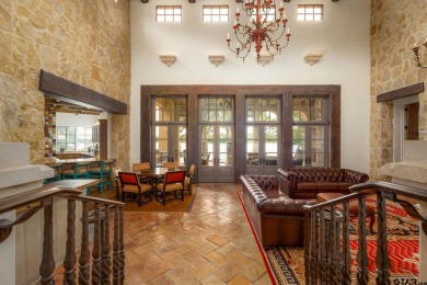 This exquisite waterfront Italian Villa sits on one acre in the on Cascades Golf Club in Texas - for sale on GolfHomes.com, golf home, golf lot