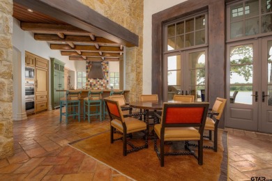 This exquisite waterfront Italian Villa sits on one acre in the on Cascades Golf Club in Texas - for sale on GolfHomes.com, golf home, golf lot