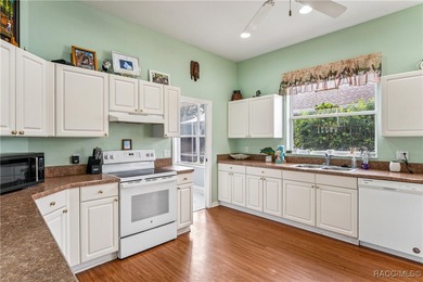 Beautiful 3-bedroom, 2-bath pool home with a 2-car garage on Southern Woods Golf Club in Florida - for sale on GolfHomes.com, golf home, golf lot