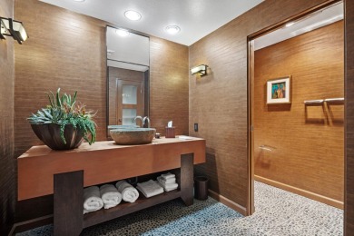Upon entering this beautifully two-bedroom, two-bath condo on Desert Island Golf and Country Club in California - for sale on GolfHomes.com, golf home, golf lot