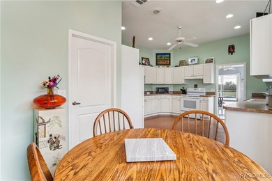 Beautiful 3-bedroom, 2-bath pool home with a 2-car garage on Southern Woods Golf Club in Florida - for sale on GolfHomes.com, golf home, golf lot