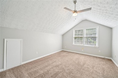 Welcome to this beautiful brick front home nestled on a sweeping on Hidden Hills Country Club in Georgia - for sale on GolfHomes.com, golf home, golf lot