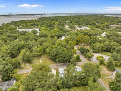 * New Pictures*This corner lot in downtown Ocean Springs is a on Gulf Hills Golf Club in Mississippi - for sale on GolfHomes.com, golf home, golf lot