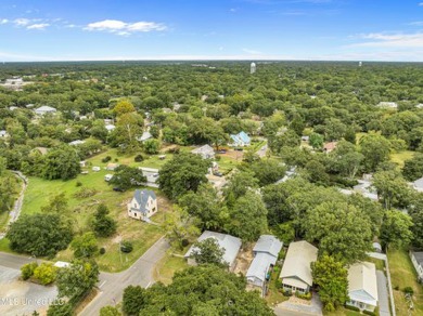 * New Pictures*This corner lot in downtown Ocean Springs is a on Gulf Hills Golf Club in Mississippi - for sale on GolfHomes.com, golf home, golf lot