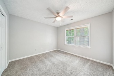 Welcome to this beautiful brick front home nestled on a sweeping on Hidden Hills Country Club in Georgia - for sale on GolfHomes.com, golf home, golf lot
