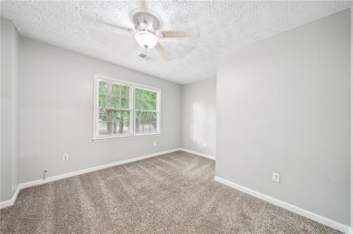Welcome to this beautiful brick front home nestled on a sweeping on Hidden Hills Country Club in Georgia - for sale on GolfHomes.com, golf home, golf lot